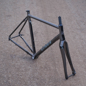 Kinesis 4S Frameset Graphite Grey on a  sunny road