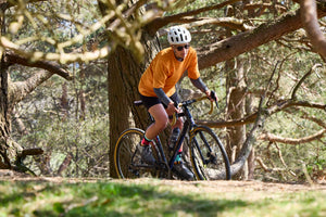 Kinesis Ambassador Fran riding a Tripster AT Blue frame