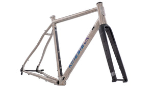 A silver Tripster ATR bike frameset with blue and black details, including a fork, displayed against a white background.