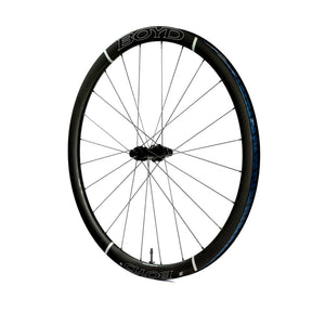 A black BOYD Cycling 36mm carbon fibre bicycle wheel with black spokes and a blue sidewall tape, shown against a plain white background.