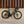 A fire branded road bike leaning against a wall with wooden pillars above and complete with Boyd Cycling 55mm SL Carbon Road wheels