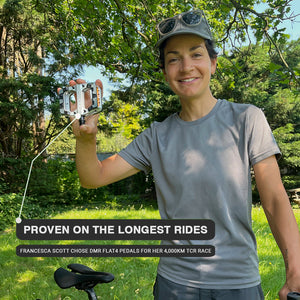 DMR Flat 4 pedal on a bike being displayed by Kinesis Ambassador Fran.