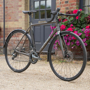 Kinesis 4S Tiagra Road Bike - Graphite Grey three quarter front