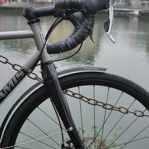 Fend Off front mudguard on a bike next to a river