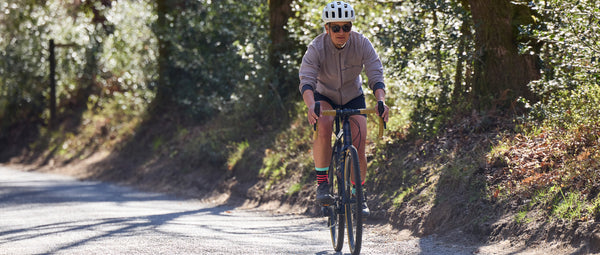 Fran riding a Kinesis Tripster AT on the road in the North Downs