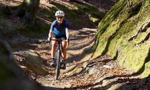Fran riding through a gulley on the North Downs