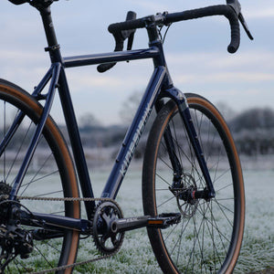 The Kinesis GX Race frameset in midnight blue photographed on a frosty morning.