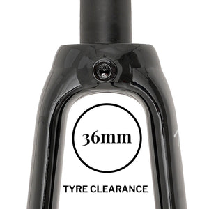Close-up of a glossy black bicycle fork showing a 36mm tyre clearance area with printed text on a white background.