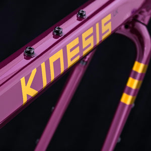 Kinesis Tripster AT Dark Plum down tube on a black background