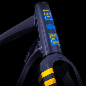 Kinesis Tripster AT Midnight Blue head set badge on a black background