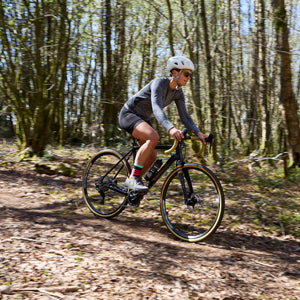 Tripster AT being ridden through woods in sunshine