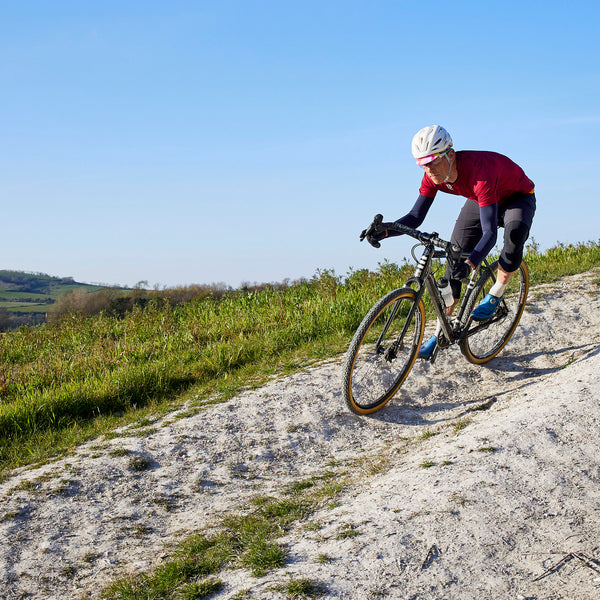 Kinesis Tripster AT being ridden down a dusty trail.