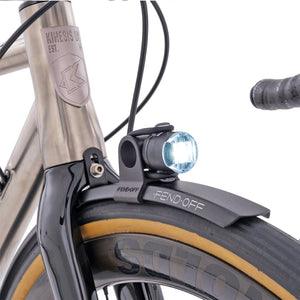 Fend Off Ffront light mount with a Lezyne Femto light on a bike.