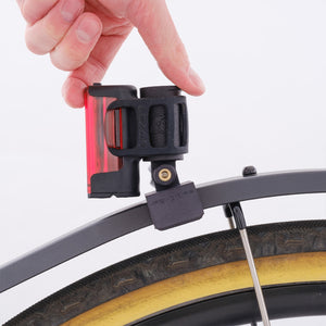 fend off rear GoPro pillar mount with light attached on a bike.