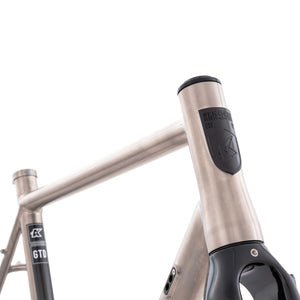 Kinesis GTD titanium road frameset close up of the head badge.