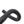 A close-up of a black textured bicycle handlebar grip, showing the knurled fabric texture and a black rubber end cap, isolated on a white background.