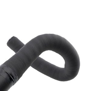 A close-up of a black textured bicycle handlebar grip, showing the knurled fabric texture and a black rubber end cap, isolated on a white background.