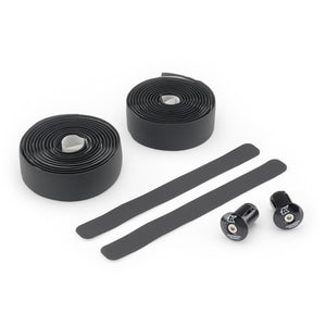 Black Kinesis 4 Seasons 3.5mm bicycle handlebar tape set with two rolled sections of tape, two long straight pieces, and two black quick-release end plugs on a white background.