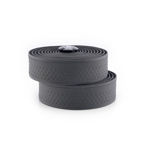 Two rolls of textured bicycle tape in dark gray, stacked on a clean white background.
