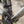 Close-up of a Kinesis Titanium GTD frame with a black seat-tube clamp holding a black saddle, on a mountain bike with a silver fork and black crankset. A black label on the fork reads 'G0 THE DISTANCE'.
