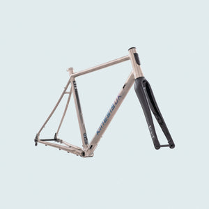 Kinesis GTD Titanium frameset on a coloured background.