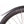 A black bicycle mudguard attached to a wheel, with anodised aluminium construction and laser graphics.
