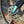 Close-up of a bicycle disc brake with 'RANGE' branding on a brick background