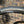 Bicycle tyre with Panaracer GravelKing SS branding against a brick wall background
