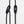Black and white adjustable Wholegrain Cycles bungees with stitching and two black plastic toggle sliders, shown on a clean white background.
