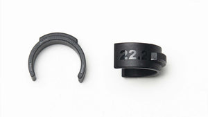 Pair of black Wholegrain Cycles 22.2mm inserts on a white background