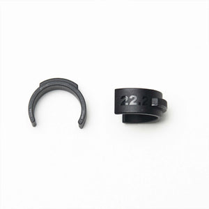Pair of black Wholegrain Cycles 22.2mm inserts on a white background